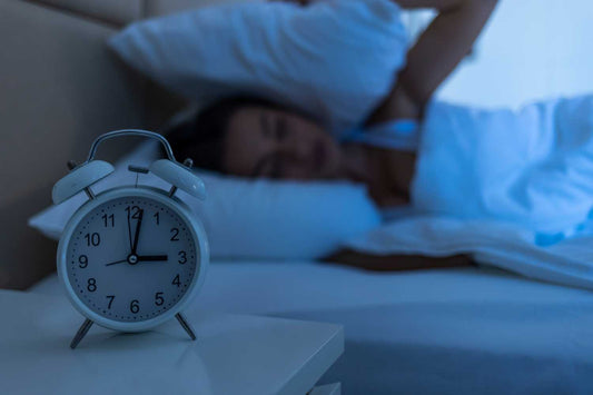 Femme qui se réveille à 3h du matin
